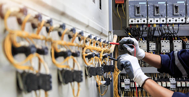 Professional Electrician technician working in Garland, TX